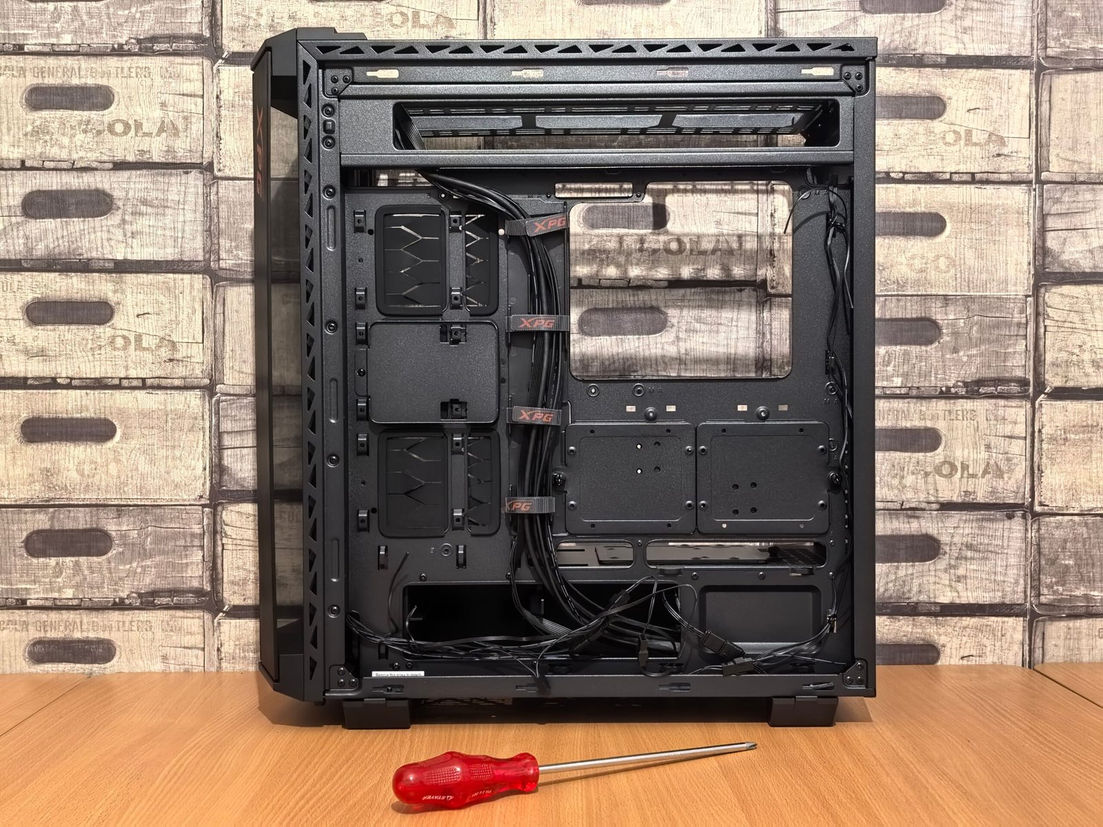 PC case side panel being removed without tools during tool-free PC building