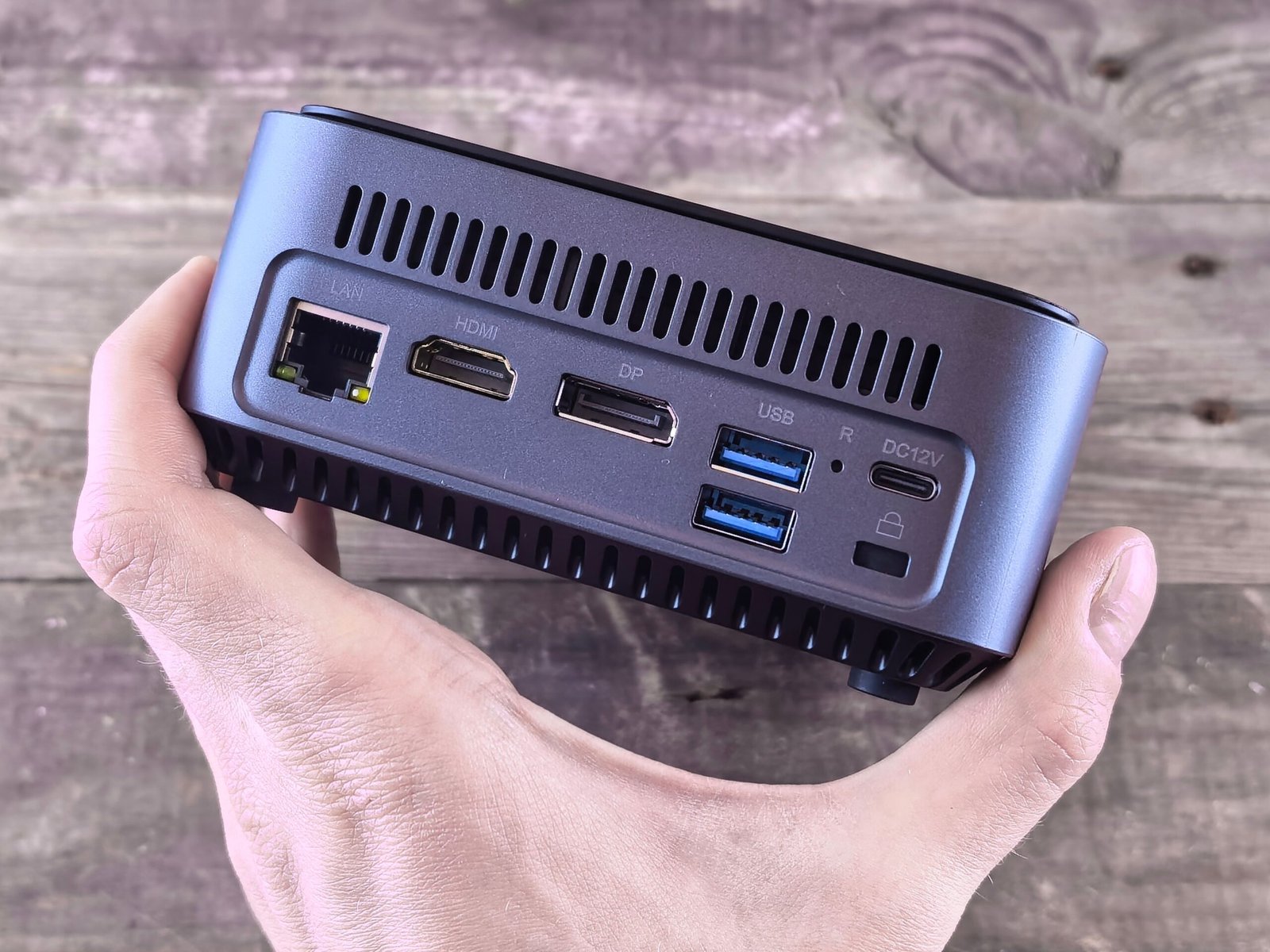 Compact future desktop PC case next to a traditional full tower for size Comparison